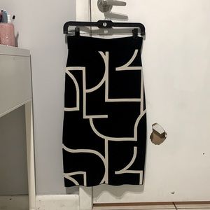 Knee length sweater skirt from H&M. size small. Black with off white design.